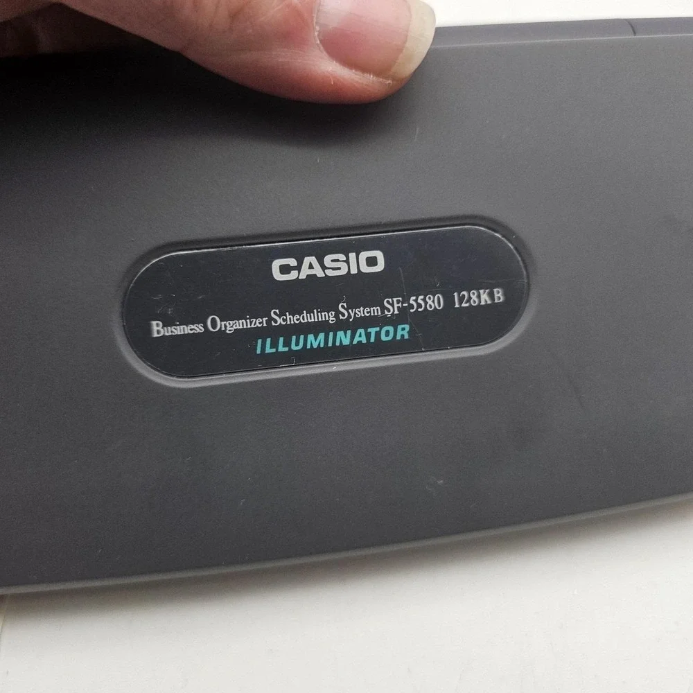 Vtg Casio Executive BOSS SF-5580W Illuminator Organizer 128KB Black See VIDEO